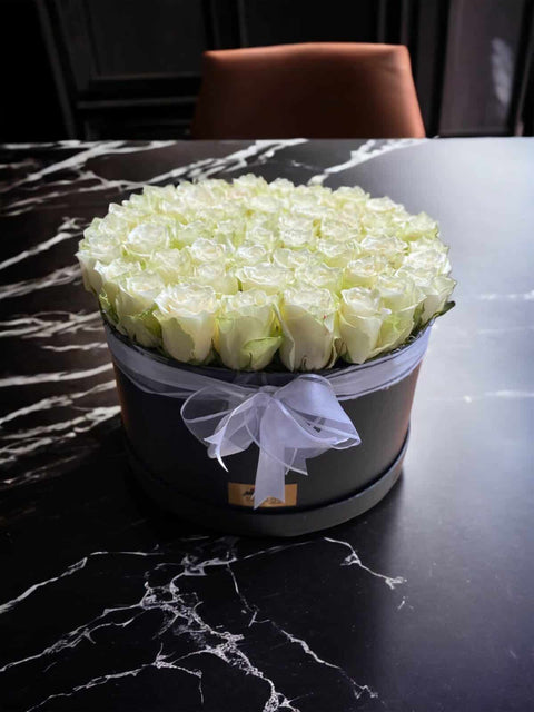 50 White roses in a black box