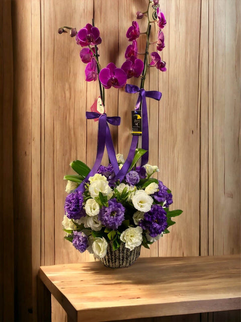 a24 Orchid and spring-flowered lisianthus arrangement